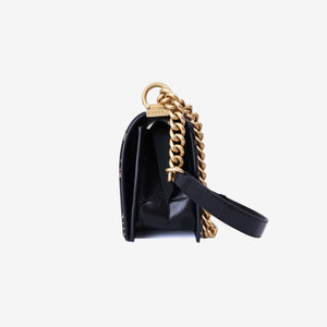Chanel Medium Boy Flap Bag in Black Embossed Calfskin Leather with Gold Hardware