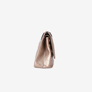 Chanel 2.55 Reissue Maxi Double Flap Bag in Metallic Champagne Lambskin Leather with Ruthenium Hardware