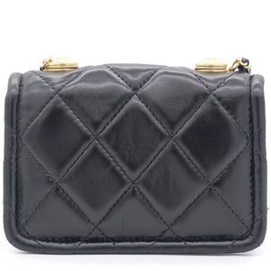 Lambskin Quilted Nano Flap Bag with button details Black