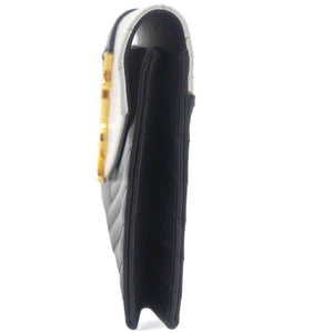 Matelasse Chevron Monogram Cassandre Clutch Black White