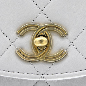 Quilted Lambskin Top Handle Flap Bag