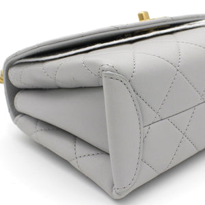 Quilted Lambskin Top Handle Flap Bag