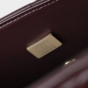 Classic Mini Quilted Leather Rectangular Flap Bag.